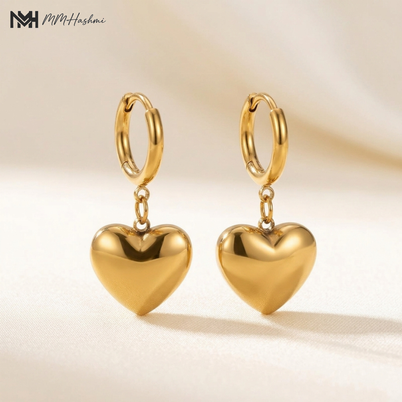 Puffed Heart Gold-Tone Stainless Steel Huggie Earrings