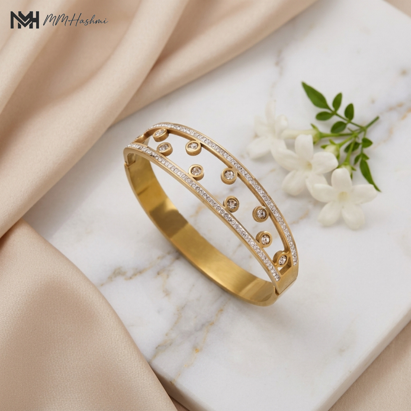 Crystal Accent Gold-Tone Dot Style Stainless Steel Bangle